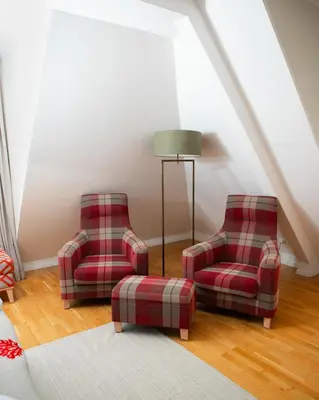 Ein Sitzbereich in der Unterkunft Hotel Altes Fährhaus