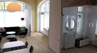 Ein Sitzbereich in der Unterkunft City Apartment (barrierefrei)