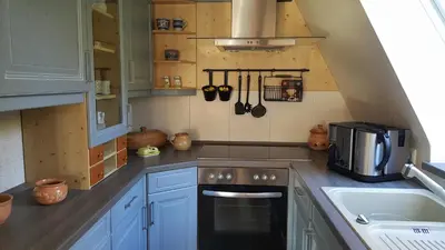Küche/Küchenzeile in der Unterkunft Ferienhaus am Lübbesee