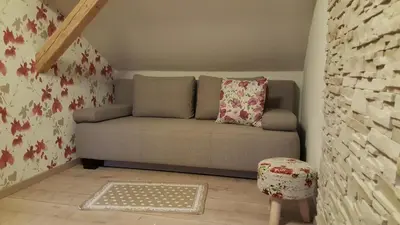 Ein Sitzbereich in der Unterkunft Ferienhaus am Lübbesee