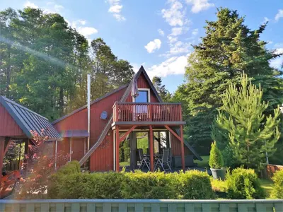 Ein Garten an der Unterkunft Ferienhaus am Lübbesee