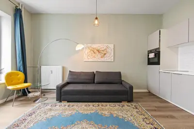 Ein Sitzbereich in der Unterkunft primeflats - Apartment Langhans Berlin-Weißensee