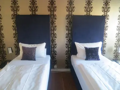 Ein Bett oder Betten in einem Zimmer der Unterkunft Berlinapartments-Downtown