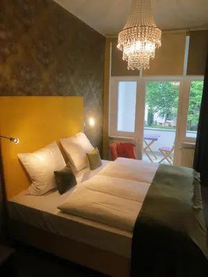 Ein Bett oder Betten in einem Zimmer der Unterkunft Berlinapartments-Downtown