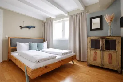 Ein Bett oder Betten in einem Zimmer der Unterkunft Design Apartments - 