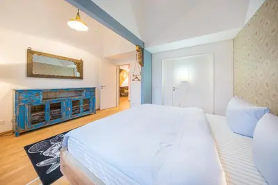 Ein Bett oder Betten in einem Zimmer der Unterkunft Design Apartments - 