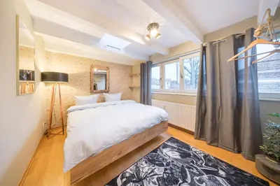 Ein Bett oder Betten in einem Zimmer der Unterkunft Design Apartments - 