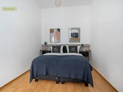 Ein Bett oder Betten in einem Zimmer der Unterkunft Apartment Berlin Paul-Robeson-Straße