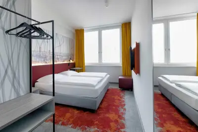 Ein Bett oder Betten in einem Zimmer der Unterkunft Campanile Berlin Brandenburg Airport