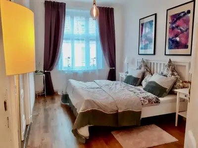Ein Bett oder Betten in einem Zimmer der Unterkunft Ferienwohnungen am Ruppiner See und Fontane Therme