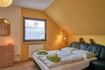 Ein Bett oder Betten in einem Zimmer der Unterkunft Ferienwohnung am Stadtrand von Berlin