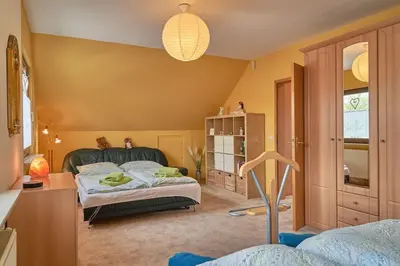 Ein Bett oder Betten in einem Zimmer der Unterkunft Ferienwohnung am Stadtrand von Berlin