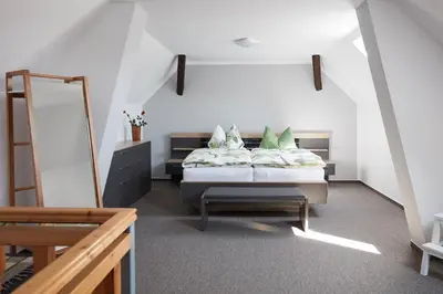 Ein Bett oder Betten in einem Zimmer der Unterkunft Ferienhaus Carola