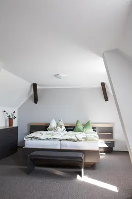 Ein Bett oder Betten in einem Zimmer der Unterkunft Ferienhaus Carola