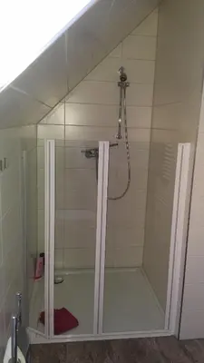 Ein Badezimmer in der Unterkunft NR- Fewo mit Ladestation für E-Autos
