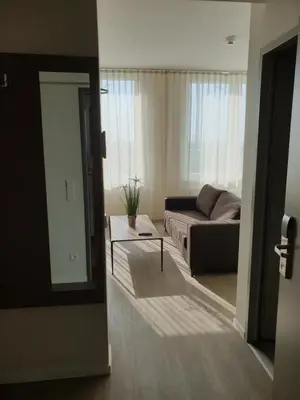 Ein Sitzbereich in der Unterkunft Motel Plus Schönefeld