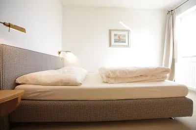 Ein Bett oder Betten in einem Zimmer der Unterkunft Ferien in Himmelpfort