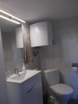 Ein Badezimmer in der Unterkunft Ferienhaus am Langen See II