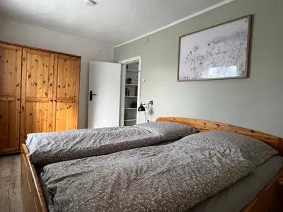 Ein Bett oder Betten in einem Zimmer der Unterkunft house46-1