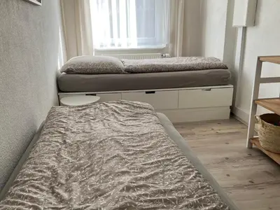 Ein Bett oder Betten in einem Zimmer der Unterkunft house46-1