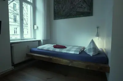 Ein Bett oder Betten in einem Zimmer der Unterkunft Pension Mädchenkammer