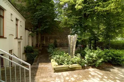 Ein Garten an der Unterkunft Pension Mädchenkammer
