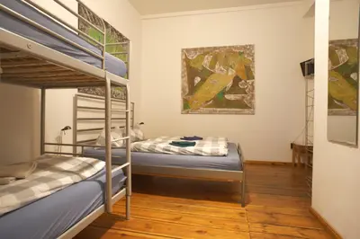 Ein Bett oder Betten in einem Zimmer der Unterkunft Pension Mädchenkammer