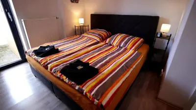 Ein Bett oder Betten in einem Zimmer der Unterkunft Lovely Hohen Neuendorf