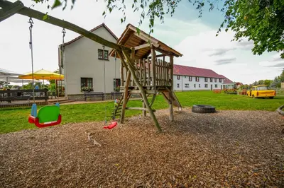 Ein Kinderspielbereich in der Unterkunft Scheunenherberge