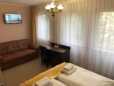 Ein Bett oder Betten in einem Zimmer der Unterkunft Atlas Berlin Hotel