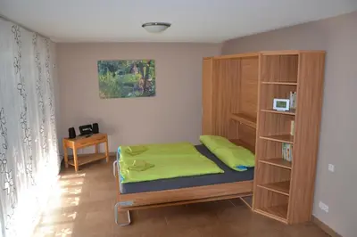 Ein Bett oder Betten in einem Zimmer der Unterkunft Adebarsoase