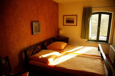 Ein Bett oder Betten in einem Zimmer der Unterkunft Seminar- und Gästehaus Flussbad Gartenstrasse
