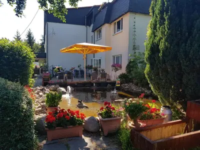 Ein Garten an der Unterkunft Landhotel Trampe