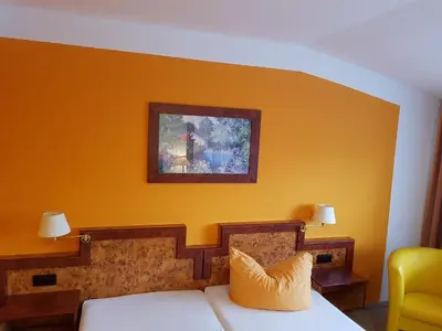 Ein Sitzbereich in der Unterkunft Landhotel Trampe