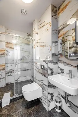 Ein Badezimmer in der Unterkunft Hotel Prens Berlin