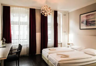 Ein Bett oder Betten in einem Zimmer der Unterkunft Hotel Prens Berlin