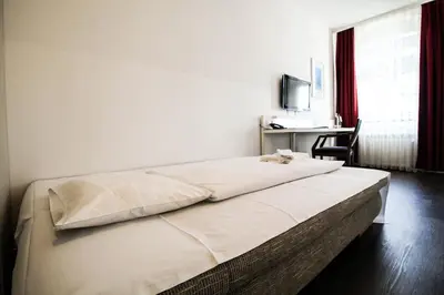 Ein Bett oder Betten in einem Zimmer der Unterkunft Hotel Prens Berlin