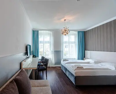 Ein Bett oder Betten in einem Zimmer der Unterkunft Hotel Prens Berlin