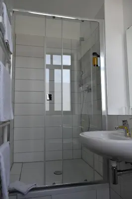 Ein Badezimmer in der Unterkunft Motel Schönefeld