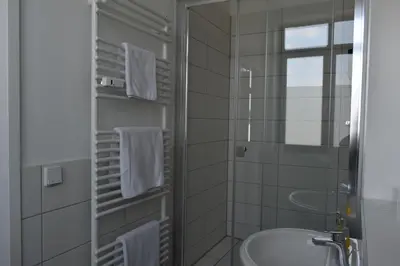 Ein Badezimmer in der Unterkunft Motel Schönefeld