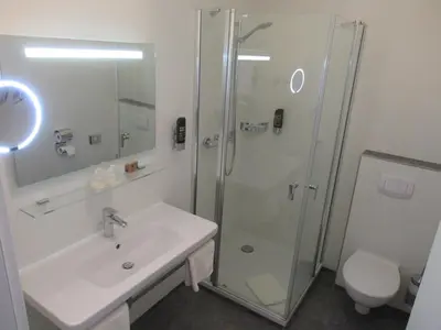 Ein Badezimmer in der Unterkunft Hotel Markgraf
