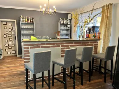 Lounge oder Bar in der Unterkunft Riverside Inn