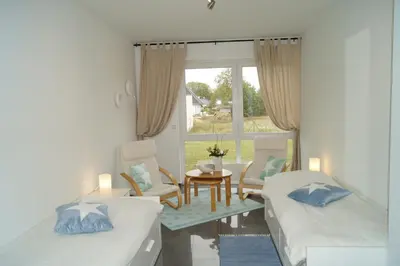 Ein Bett oder Betten in einem Zimmer der Unterkunft Apartment zum Strand