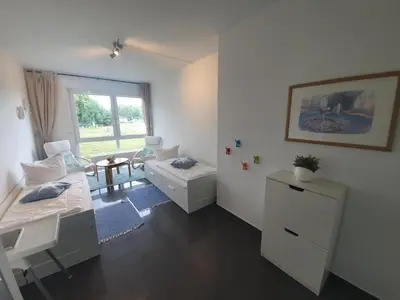 Ein Bett oder Betten in einem Zimmer der Unterkunft Apartment zum Strand
