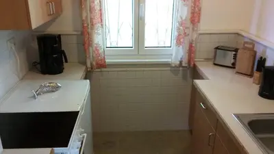 Küche/Küchenzeile in der Unterkunft Ferienhaus direkt am See