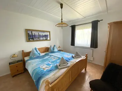 Ein Bett oder Betten in einem Zimmer der Unterkunft Ferienhaus Schmidt