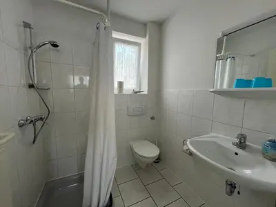 Ein Badezimmer in der Unterkunft Ferienhaus Schmidt