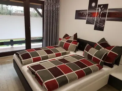 Ein Bett oder Betten in einem Zimmer der Unterkunft Ferienwohnung Auszeit Bad Belzig Näthe