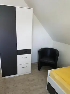 Ein Bett oder Betten in einem Zimmer der Unterkunft Ferienwohnung Auszeit Bad Belzig Näthe
