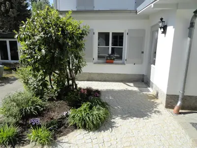 Ein Garten an der Unterkunft Cottage Ferienwohnung mit Seeblick
